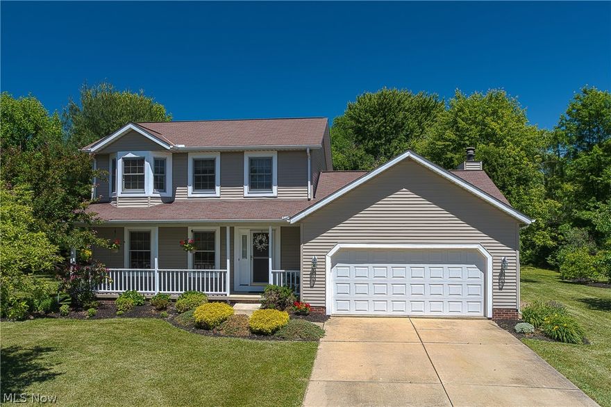 Beautiful home in move-in condition!  Great floor plan and lots of wood floors.  Great landscaping with lots of privacy.  Large deck off family room plus beautiful patio with lovely view of manicured gardens and trees.  Granite countertops in kitchen with pantry and hardwood floors.  Low traffic area.  Dehumidifier in basement stays.  No surface water due to French drains going into storm sewers.