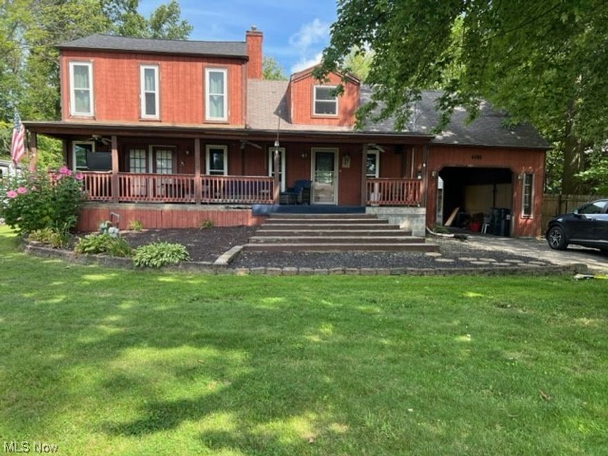 Looking for that extra large home inside and out for the family. This is the place.  This large two story home sits on an extra large lot.  You enter the home from an 8 x 40 covered porch expanding the entire length of the home. As you enter the  dining room that adjoins the large kitchen with plenty of cupboards and an island you can use as a work area or extra seating. There is a door leading from the kitchen to the covered car port.  The extra large living room features several windows to allow for natural light and a door leading to a 12 x 16 deck overlooking the private backyard. The upstairs has a master bedroom, a walk-in-closet a a full bath with walk-in-shower.  There are two additional large bedrooms completing the second floor. Outside a large driveway with a  turn around area and a covered carport that leads to a large two car garage.  The home is within 1/2 mile to the school and close to plenty of shopping and restaurants.