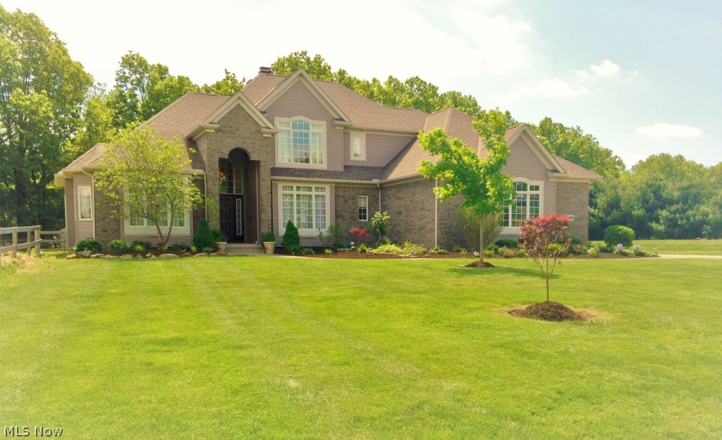 A warm welcome awaits you as you enter this Kingsmill Crossing 4 bedroom home on 2.24 acres. The Great room invites you in with its double sided fireplace and views of the private backyard. This homes many features include a large and airy kitchen, breakfast nook and sunroom, formal dining area, first floor Owners Suite overlooking the pond, first floor laundry, and private office.