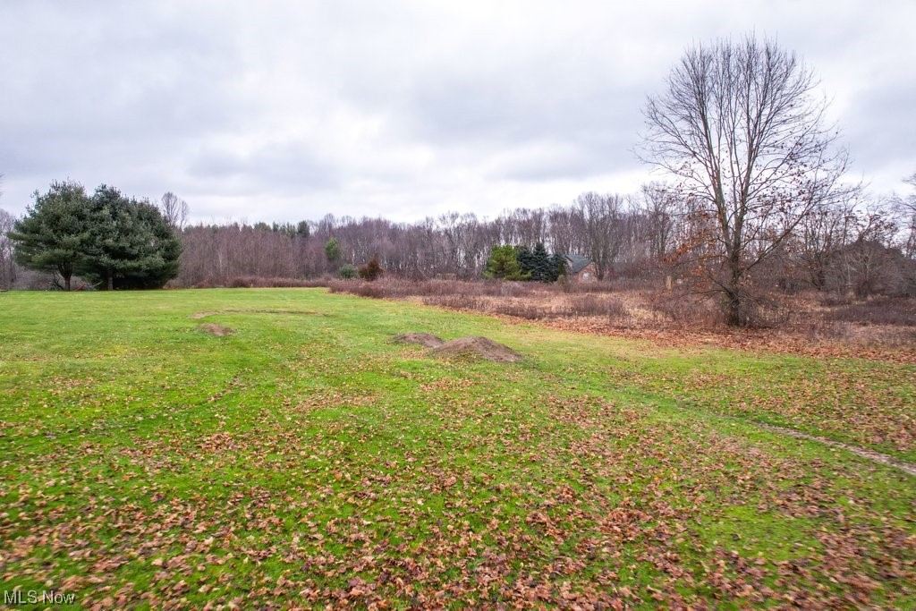 Bring your builder and discover your canvas for a dream home on Schustrich Road in Hiram Township! This sprawling 5.08-acre parcel is nestled in a serene country setting mere minutes from downtown Mantua, the Ohio Turnpike, and Routes 44 and 82. Situated in the coveted Crestwood School District, this prime land with private trails for exploring and pond views offers an idyllic escape with the convenience of nearby amenities, lower taxes and limited property restrictions. Whether it's a sprawling estate or a charming retreat, don't miss this opportunity to craft your ideal home in a location that effortlessly combines convenience with peaceful rural living. Come see today!