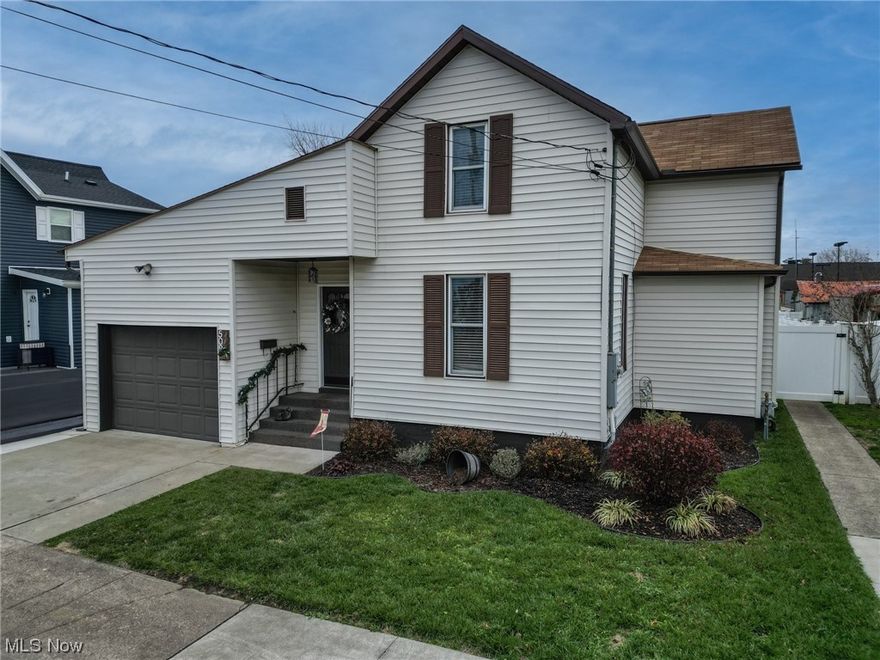 Welcome to 509 Columbia Ave! This beautiful home has been recently renovated from top to bottom and is ready for its new owners. This beauty offers the potential for one floor living with the living room, galley-style kitchen, dining room, primary bedroom, primary bath and laundry ALL located on the main level.  Upstairs you will find an additional two bedrooms and a gorgeous, spacious full bath.  Everything has been tastefully updated and renovated in this bungalow style home. New luxury vinyl tile throughout as well! Step outside to discover a fully fenced flat back yard with a patio area, detached garage, an additional shed and alley access.  Super easy yard maintenance and privacy too.  This home is nestled on a quiet street within walking distance to the high school, public pool and Tomlinson Park. The entire home exudes a cozy feel, with neutral colors that create a soothing and timeless aesthetic. Set up your showing today! You don't want to miss out!