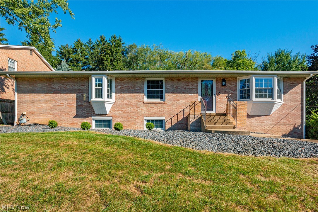 Come see this gorgeous ranch situated in a quiet North Canton neighborhood, within walking distance to Main Street. As you walk in the front door, you're greeted by a spacious living room, followed by an even larger dining room, perfect for gatherings. The tastefully designed kitchen comes complete with stainless steel appliances, Tuscany-inspired tile backsplash and crisp, white cabinets. The 3-seasons room on the rear of the home will certainly become your favorite space, featuring new carpet, windows galore, and a ceiling fan for warm summer nights. Three bedrooms and 2 full bathrooms with are situated on the west end of the home. The main bedroom has a conveniently attached main bathroom. One bedroom and the second full bathroom have brand new skylights, allowing for beautiful natural light to filter in. The basement is partially finished with a half bath, and could double as a rec room, office, or large TV room. The basement leads out to the attached 2 car garage. Newer renovation