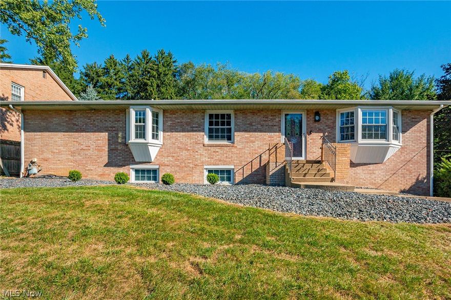 Come see this gorgeous ranch situated in a quiet North Canton neighborhood, within walking distance to Main Street. As you walk in the front door, you're greeted by a spacious living room, followed by an even larger dining room, perfect for gatherings. The tastefully designed kitchen comes complete with stainless steel appliances, Tuscany-inspired tile backsplash and crisp, white cabinets. The 3-seasons room on the rear of the home will certainly become your favorite space, featuring new carpet, windows galore, and a ceiling fan for warm summer nights. Three bedrooms and 2 full bathrooms with are situated on the west end of the home. The main bedroom has a conveniently attached main bathroom. One bedroom and the second full bathroom have brand new skylights, allowing for beautiful natural light to filter in. The basement is partially finished with a half bath, and could double as a rec room, office, or large TV room. The basement leads out to the attached 2 car garage. Newer renovation
