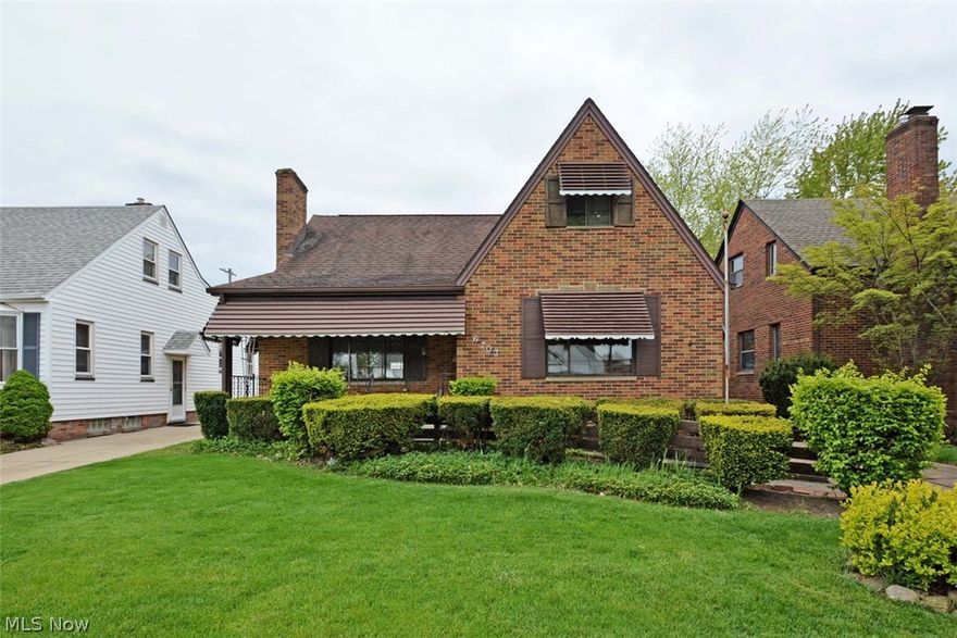 Impressive Curb Appeal On This Stately All Brick Bungalow With Traditional Front Porch. You Will Be Wowed By The Large Living Room With Its Rich Hardwood Floors and Beautiful Fireplace With Marble Inlay. Upstairs You Will Find A Large Master Bedroom Along With A Half Bath and Spare Bedroom. The Basement Provides A Finished Rec Room With Glass Block Windows As Well As A Toilet & Shower. There Is Lots Of Storage Throughout The House. Updated Roof and New Screen Doors. Nice Lot With Two Car Garage.