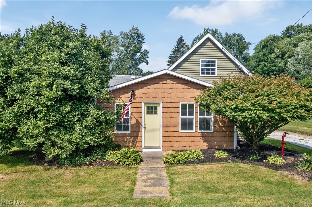 Check out this recently remodeled farmhouse in desirable Norton CSD! Situated on almost a half acre, this home features a large and welcoming front porch that leads into a living room and flex space that can be used for a dining room or extra living space. Also on the first level is an updated kitchen w/large stainless sink, full bathroom, and laundry room. Head upstairs to find two additional bedrooms. Private yard with large barn/garage. Schedule your private showing today!