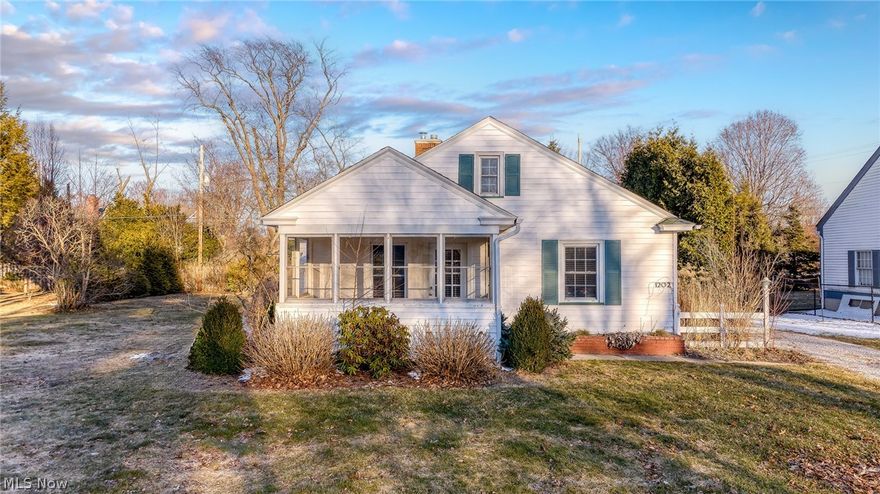 There’s something special about living near the water — and this charming 2-bedroom, 1-bath home lets you enjoy it every day. Just steps from Lake Erie, this warm and welcoming retreat offers the perfect blend of comfort, modern updates, and outdoor space.  Inside, you’ll find beautifully uncovered hardwood floors flowing throughout the home, creating a timeless and inviting feel.  Newer double-pane windows make each room bright and cheerful. The fully renovated kitchen is both stylish and practical — a lovely space to cook meals and gather with family and friends.  The kitchen has been updated with stainless steel appliances, stone counters, and tile backsplash.  The updated full bathroom has been thoughtfully redesigned with fresh, modern finishes.  The fully enclosed front porch is a favorite — perfect for morning coffee, evening chats, or simply unwinding after a peaceful walk along the lake. Laundry is located in the basement.  Situated on a rare double lot, there’s plenty of room to enjoy the outdoors. Play baseball in the side yard or host summer gatherings on the deck.  The pergola area creates a charming outdoor retreat, ideal for dining al fresco. The extra-long driveway makes guest parking easy, and the 2-car garage with attached workshop provides space for hobbies, storage, or weekend projects.  Whether you’re looking for a year-round home or a weekend escape, this sweet lakeside escape celebrates the simple joys of lake living.  This home is equipped with central air.  See listing agent for full list of extensive improvements with dates.