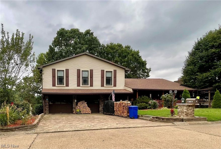 This home features a full mother-in-law suite option in the lower level with a wood-burning fireplace, 3 bedrooms with 2 full baths on the upper floor, a sun room to enjoy the breathtaking sunsets, and an enclosed screened-in deck connecting to other decks that overlooks the South Hills Golf Course, which is conveniently located close to shopping and entertainment.
Picture a very grand, spacious master suite that has a balcony, multiple closets- one walk-in, a wood-burning fireplace, and a newly renovated full master bathroom. Now, continue throughout the home to find generous bedroom sizes, wide-sweeping stairwells on the main floors, and beautiful woodwork in the home, a level of luxury awaits you here!  
The main levels above ground of the home have a total of 2,672 sq ft. with an additional 729 sq ft in the lower level apartment option for a total of 3,401 sq ft. This home has so many features that you don't want to miss out on. Call to schedule your tour today!