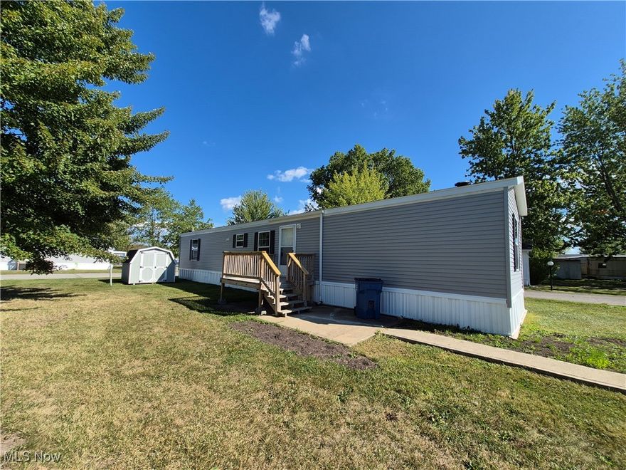 Move right in to this charming 3-bedroom, 2-bath ranch home featuring an open floor plan and convenient in-suite laundry area. The kitchen comes complete with appliances, making it easy to settle in and start living. Enjoy a vibrant community with monthly activities, plus access to a pool and playground—all with a low lot fee. A handy shed provides extra storage for outdoor items. Ideally located near highways and shopping, this home combines comfort, convenience, and affordability in one perfect package.