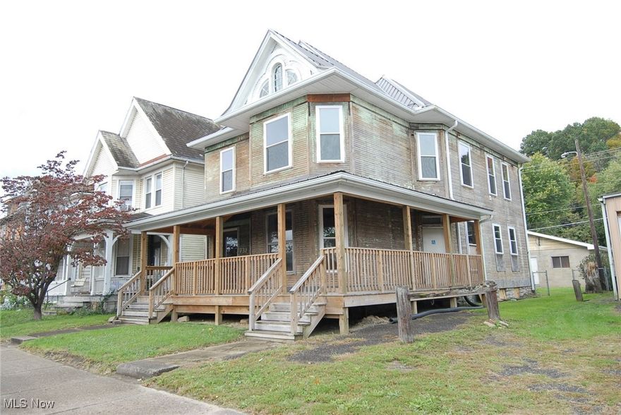 New metal roof in 2020, new wraparound porch along with replacement windows.  Two car block garage with concrete floor.  Interior is unfinished.  Selling in as is condition.  Listing agent has a dower interest and is related to seller.