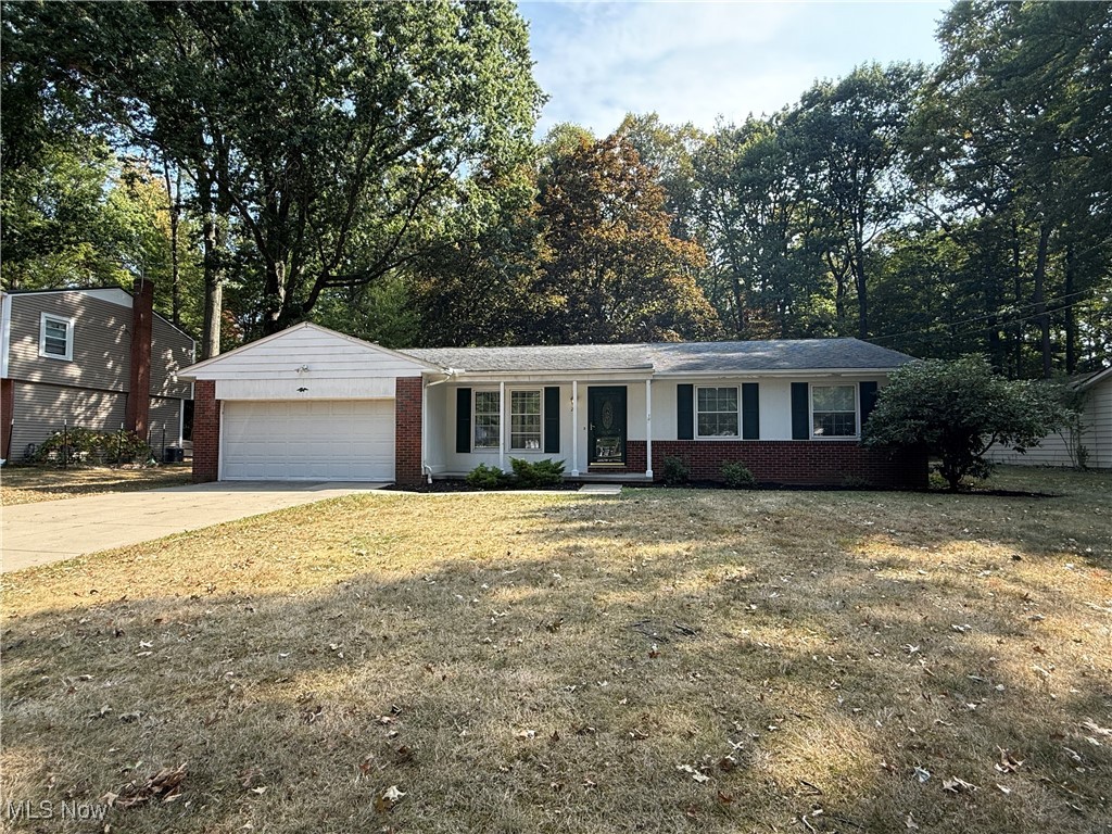 Welcome to 213 Green Hill - This Tallmadge Ranch Home Features 3 Bedrooms, 2 Full Bathrooms and a 2 Car Attached Garage. You are Welcomed into an Inviting Family Room & continuing through you will see a Fantastic Kitchen that has an Open Feel, plenty of Seating Options and easy access to a Living Room w/ Wood Burning Fireplace in the back portion of the home. The other end of the house conveniently offers 3 Bedrooms, a Full Hall Bath along with an En Suite Master Bath. The Basement provides plenty of options to Finish for some Extra Living Area, Storage or even a Workshop area. The Exterior of the Home starts with Attractive Curb Appeal and continues around to the Private, Flat Backyard. Per Owner Roof is 12 yrs old, HVAC Systems and HWT 10 yrs old, Newer Electrical Panel. Set up your Showing Today!!