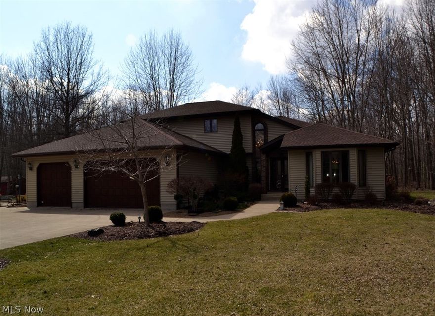 Absolutely stunning custom-built Country home!  Features include cozy family room with wood burning fireplace with gas log starter, formal living and dining rooms, gourmet kitchen with Granite transformation counter tops, snack bar island with Whirlpool gas range, tile back splash, Bosch stainless-steel dishwasher, Kenmore refrigerator, raised panel cabinets, under cabinet lighting, ceiling fan, tile floor plus 11' x 16' dining area with vaulted ceiling, two story foyer with double door entry and hardwood floor, first floor master suite with spacious bedroom, full bath with walk-in dressing room, whirlpool tub, shower stall, tile floor and make-up table, three additional spacious bedrooms, 2.5 baths, convenient first floor laundry room with extra cabinets, laundry tub and folding table. All custom window treatments remain, full basement with Rheem high efficiency gas furnaces, Rheem Central Air conditioner, Aprilaire humidifier, basement "man cave," 16' x 30' basement workshop, loads o