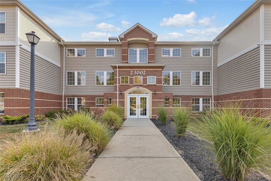 Welcome to 23002 Chandlers Lane Unit 229! Built in 2020, this stylish 2-bedroom, 2-bath condo offers low-maintenance living with all the right upgrades and modern comforts that come with new construction. Rare corner unit layout with each bedroom having its own bath and walk in closet. The open layout is filled with tons of natural light and features a welcoming living room with a gas fireplace. The kitchen boasts stainless steel appliances, a modern backsplash, and quartz countertops, with bar height seating making it both functional and attractive. Sliding patio door invites you to step out onto your private balcony to relax and take in the outdoors while overlooking the courtyard. The primary suite includes a private full bath, while a second full bath adds additional convenience. Enjoy the ease of in-unit laundry, and the peace of mind that comes with newer construction.With spacious rooms, thoughtful finishes, and a prime location, this condo is perfect for anyone seeking comfort and convenience. Private 1 car garage with opener  and extra secured storage space located in hallway. Water and Sewer included in HOA. Schedule your showing today!