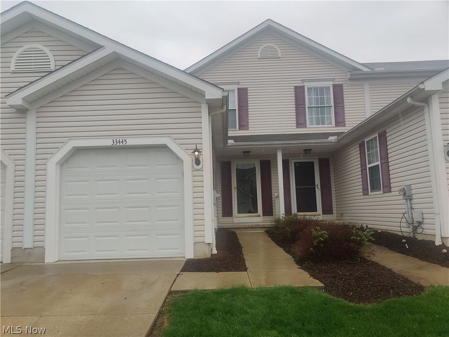 Welcome to this Beautiful and meticulously maintained Townhome in Desirable Avon Lake! Loads of upgrades! This Home features an open layout and spacious great room with brick surround fireplace. Gorgeous natural light in this home with many large south-facing windows! Great room features sliding doors leading you to a wonderful outdoor patio for relaxing or entertaining, with privacy landscaping and shrubs. Completely Redone eat-in kitchen features a beautiful white subway tile backsplash, loads of  two-tone cabinets, Calacatta Marble Laminate Countertop, Farmhouse sink, Vinyl Plank Flooring and all appliances stay! Upstairs you will find 2 Generous Sized Bedrooms with loads of closet space, and a Full Bath that has been remodeled. Full, Partially Finished Basement with Laundry Area, Loads of Storage and Rec Area. Attached Garage for convenience, and plenty of additional parking in this community! Absolutely spotless and move-in ready, this meticulously maintained townhouse is waiting