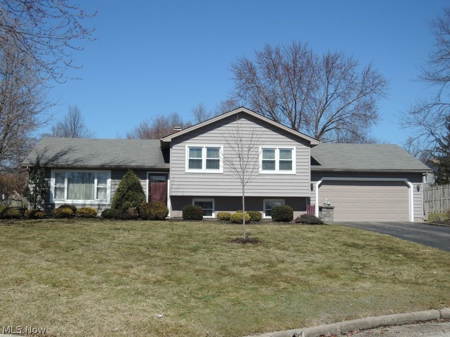 Absolutely one of the most deceiving houses from the street you will find!  Cul-de-sac...Outside is beautiful with newer vinyl siding (2011) vinyl windows (ex3 in 2011) newer garage door and landscaping.  But you HAVE to see the inside!!!  Large updated kitchen, large formal dining room and an amazing great room addition with a beautiful fireplace w gas line and heatolater.  If that hasn't knocked your socks off then go to the HUGE master bedroom (21 x 13)!!!  with a 10 x 10 master bath remodeled by Duncan (2014) 2 other perfect bedrooms and a main bath with new vanity and ceramic.  The lower level features a half bath, large family room (which has a closet so could be another bedroom) another room with built in ironing board & partial basement. Furn/ air (2005) roof (2005) HWT (2014) Lot's of new lighting and ceiling fans in the last year.  Large 24 x 14 deck (2010)...private yard.  Not to mention spotless to top it off!