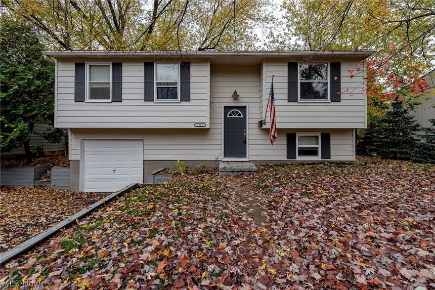 Phenomenal opportunity for your next home in Kent! This charming home features an open layout, an eat-in kitchen, and spacious bedrooms. All that is missing is you! Beautiful wood-look floors greet you in the living room and flow into the kitchen. The kitchen features all appliances, a breakfast bar, and a sunny eat-in area with deck access, perfect for enjoying summer cookouts! Three spacious bedrooms and an updated full bathroom complete the first floor. The lower level includes a spacious family room with ground level windows, a laundry area, and garage access. Outside, there is an attached 1 car garage and a large deck that overlooks the backyard. Located off of Silver Meadows Boulevard, this home is just minutes away from area parks, Jessie Smith Nature Preserve, area shopping, and dining destinations.  Do not miss out on this opportunity to own a delightful home in a prime location!