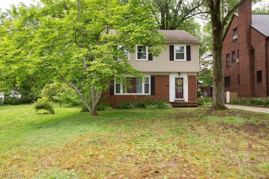 Beautiful Colonial on a mature street In University Heights. This three-bedroom two bath home is simply stunning. From its original hard wood floors to its amazing private back yard. There is a nice size all season room that would make a great office, playroom or craft room and still be close to all of the family. The back yard has a nice, shaded patio for summer picnics. The basement has a finished room for your home gym, or a family hang out. The furnace was replaced in 2019, the Air in 2018 and the windows in 2021. Ready to move in and enjoy. Come look at it before it's gone.