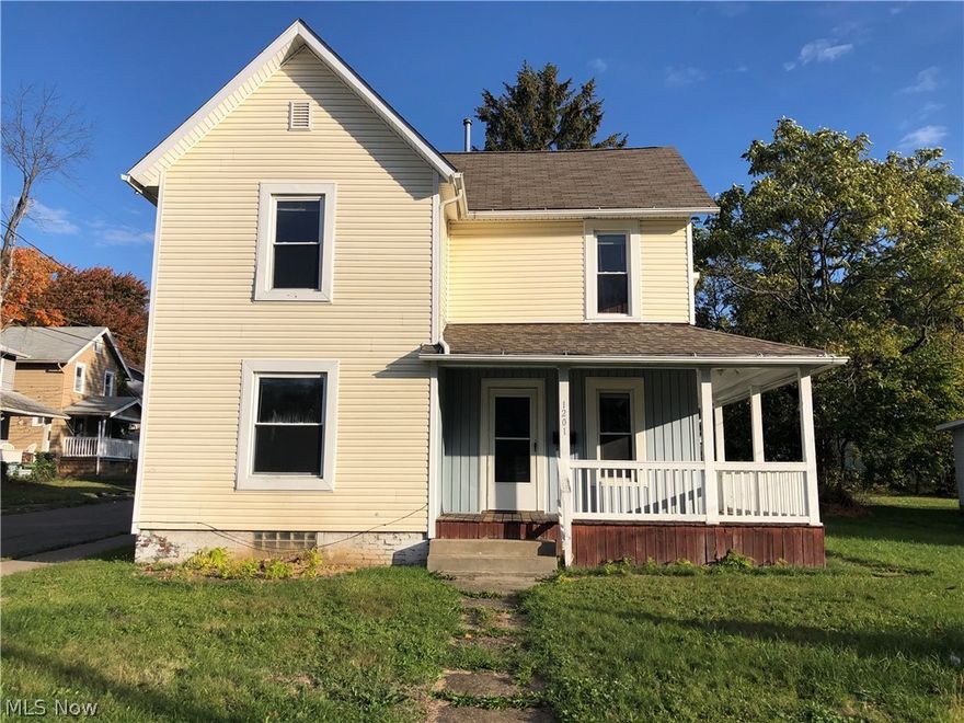 **Calling all investors!** This large home has lots of potential. It can be a single family home or converted back into a duplex! Outside you will see updated siding, newer glass block windows, and a wrap around porch. This home features nice original wood working! On the main level check out the large living room, eat-in kitchen, family room, 2 nice sized bedrooms, and a large full bathroom! Upstairs can be used as an in-law suite or another living space if converted back to a duplex. There is a large kitchen with a storage closet, 2 more bedrooms and a large full bathroom. There is a deck with steps off the hallway upstairs for private access to the outside. Come bring your ideas to make this home exactly how you want it!