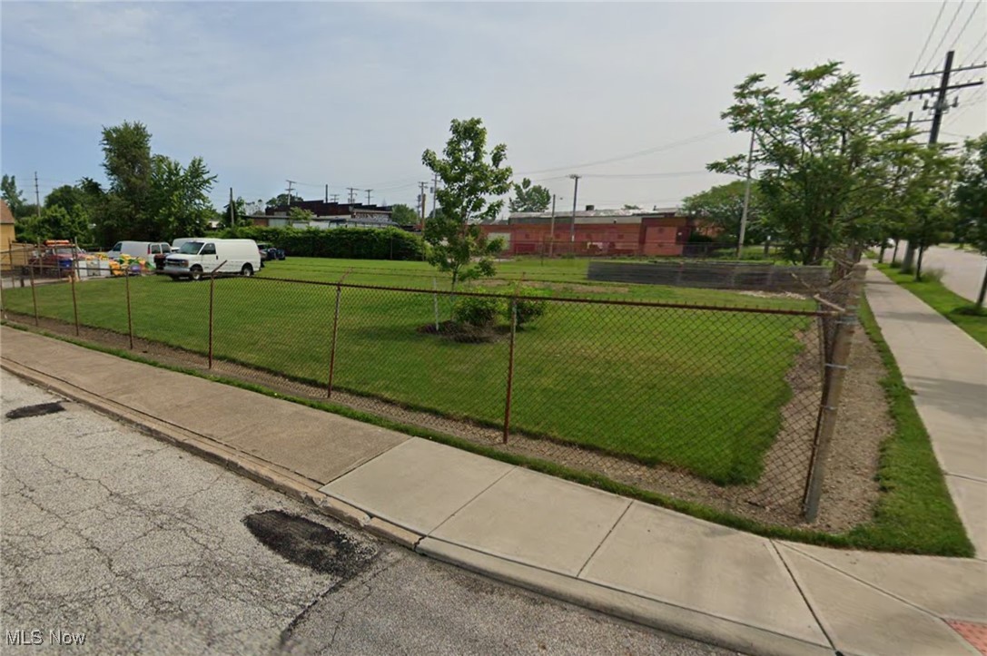 Ideally situated on Madison Ave and West 75th, this fully fenced industrial lot presents considerable potential. Already subdivided into two parcels, they can be recombined after discussing with the city. The first lot spans 0.203 acres (66x130) and the second 0.07 acres (33.3x101). Located just 10-15 minutes from Rocket Arena, Progressive Stadium, Jack Casino, Cleveland Cycle Tour, and numerous downtown attractions. This exceptional investment opportunity awaits.