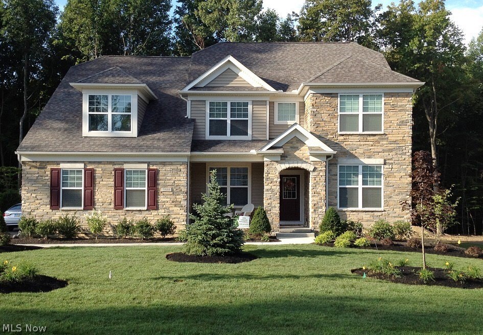Why build when you can move right into this newer beautiful transitional with stone front in the popular neighborhood of Canyon Woods. There are hardwood floors throughout the 1st floor. As you enter the foyer, it opens to the office with French doors and the DR. You then walk into the great room with a gas fireplace and a wall of windows. Open to the GR is the spacious kitchen with an abundance of cabinets, stainless appliances to include a gas cook top, double ovens & granite countertops with a large center island. This also opens to the eating area for the kitchen & the sun room with walls of windows affording great views of the backyard and a sliding door to steps to the stone patio. There is a Mom’s nook – perfect for her computer & daily schedule. All BRs are on the second floor with the master suite featuring a glamour bath with soaking tub and shower as well as double sinks and a walk in closet. The other three bedrooms and two baths are generously sized with each bedroom havin
