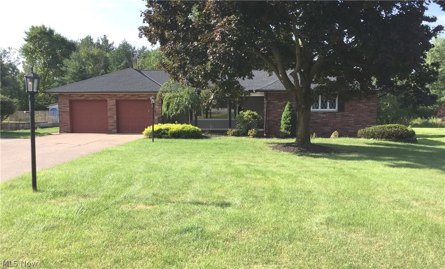 Fantastic all brick Ranch in highly desirable North Royalton School District.  Perfect for the first-time home buyers or those wanting to downsize.  Spend the winters enjoying the view from your cozy great room while basking in the glow of the stone fireplace.  Home has been lovingly maintained.  Newer roof and central air.  Move-in ready completely from top to bottom. All new flooring recently installed.