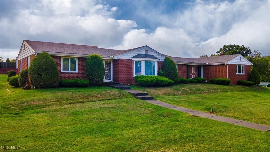 Rockdale Road Ranch! This 1/2-acre, corner lot home is exploding with tons of room at 2,261 SF and 1 level living!  Sit in the cozy oversized back breezeway on warm summer nights and listen to the calming sounds of summer.  Or relax in the living room or extra-large family room after a long day at work.  The spacious 2 car garage with room for storage is a nice bonus. This home is solid with block and brick walls, has a new roof and new HWT.  A little extra TLC will make this home pop again! It won't last long so call for your appointment to tour today!