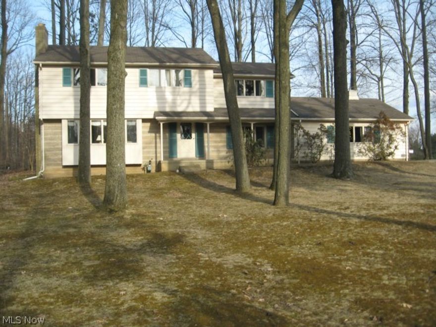 There is much potential in this 4 BR 21/2 bath colonial conveniently located in a desirable neighborhood.  
A foyer entry welcomes you and leads to formal living room on the left with large window,  built-in 
bookshelves & fireplace, & family room on the right with built in cabinets & sliding doors to patio.  The 
kitchen, formal dining room & powder room complete the first floor.  All 4 bedrooms are spacious and the 
master includes master bath.  This home is situated on a lovely wooded lot with concrete drive & room for 
extra parking.  Apply your personal touches with some cosmetic updating and make this your home today.