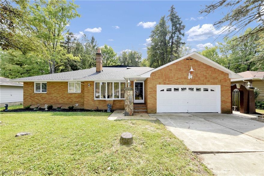 Unique home with endless possibilities! This stunning contemporary ranch has been recently remodeled with some of its’ original character restored. The entire house inside and out has been freshly painted and new flooring throughout. Main floor features a large open concept living/dining room area with a fireplace and vaulted ceilings, a spacious eat in kitchen with stainless steel appliances and three sizable bedrooms. Upstairs you will find an enormous living suite with a private kitchenette, master bath and a cozy veranda. Finished, walkout basement is massive with a rec-room, kitchen and full bathroom. A huge, covered back porch overlooks the backyard with a large shed. Perfect place to enjoy your morning coffee. All new in 2020/2021 Roof, some windows, AC, furnace and plumbing. Don’t miss out on this one. Schedule your showing TODAY!!