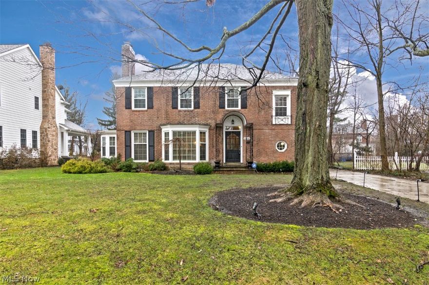 Prepare to be delighted by this artfully appointed Shaker Heights colonial that perfectly blends historic charm with contemporary amenities. Fully renovated in 2014, this home provides 2,325 square feet of living space with an open floor plan and elegant decor throughout. It is just waiting for a new owner. The living room is warm and inviting with gleaming hardwood floors and a fireplace flanked by original built-ins. The dining room is open to the kitchen with built-ins and sliders that open to the patio. Off of the dining room, there is a family room with a fireplace. The kitchen showcases granite counters, stainless appliances, and an island with a breakfast bar. Upstairs, there are 3 bedrooms and 2 bathrooms, including the luxurious master suite, and the third floor includes another bedroom suite. The full lower level is finished with a recreation room with a fireplace, plus a laundry area and plenty of storage on the unfinished side. Outside, enjoy summer cookouts and gatherings