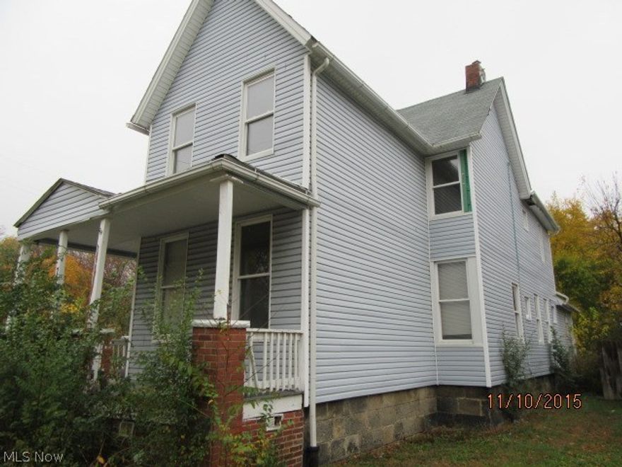 Large vinyl sided two-family priced to sell!  Close proximity to RTA bus lines, University circle, Case Western, Cleveland Botanical gardens, and everything else downtown CLE has to offer!!  Little work could go a long way....set up your showing today!