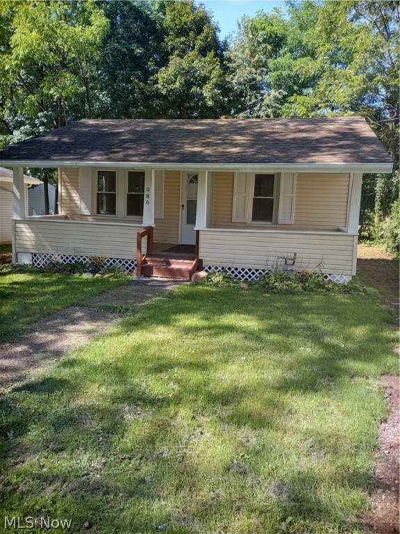 Move right in to this updated ranch in Springfield New within last year, all new eat-in kitchen including brand new oven/range and refrigerator, all new bath, new carpeting and flooring throughout, all new interior drywall, new insulation throughout, new laundry tub and glass block windows in basement, new exterior doors and screens, all new plumbing, new electric panel box and wiring, new well pressure tank and water softener, new front porch and back deck and new gutters and downspouts. The septic system was installed in September, 2021 and approved by the Summit County Health Department. Other updates include: well, 2,000, windows, 2005, roof, 2006 and hot water tank, 2017. Two driveways for extra parking with brand new gravel. Back yard grass seed sown after new septic was installed. The seller is offering an America's Preferred home warranty for the buyer. Perfect first home or last home for those wanting to downsize. Please schedule an appointment to see this updated home