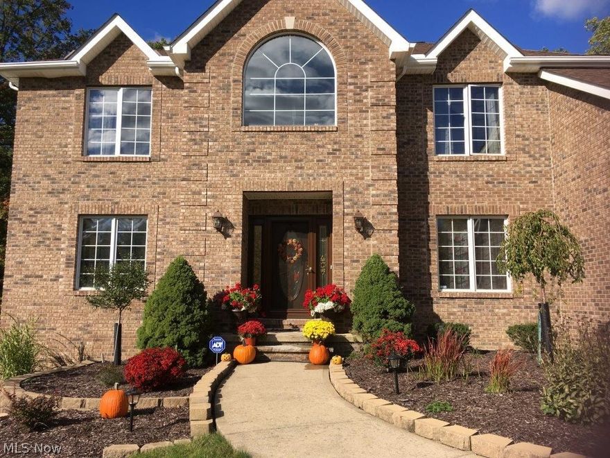 Quality custom built front brick Tudor Colonial with 3 car side load garage sits at the end of a dead end private street in a quiet development. The exterior of the home has a new roof (2016), fenced backyard, stone walkway and new landscaping. Inside you'll find beautiful cherry oak woodwork, crown molding, vaulted ceilings and plenty of updates throughout. The two story foyer with custom staircase will greet you at the front door. The large eat-in kitchen comes complete with all appliances, new granite countertops and French doors that lead to a relaxing 2 tier large deck and back fenced in yard. First floor laundry. The family room has new carpet, cathedral ceilings and a gas fireplace. The stunning master suite has vaulted ceilings, double walk-in closet and a new remodeled en suite with marble countertops, jetted tub and shower. Three other spacious bedrooms all have walk-in closets. The newly finished basement features a great room with gas fireplace, full bath and large storage