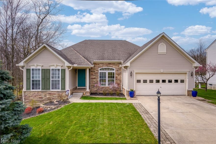 Ready to "Spring" into low-maintenance Ranch living? This North Royalton charmer will move you! Situated in the desirable Villas of Worthington, this open concept ranch home will delight you with a welcoming foyer, gorgeous updated eat in kitchen, new granite and sink, beautifully maintained hardwood cabinetry, and all appliances included! There is a bright and cheerful formal dining room (or craft room, office or study!) The home features bright new plank flooring, gas fireplace, cheerful color throughout, and the convenience of a main floor laundry! The private primary bedroom features an en-suite bath with tiled walk-in shower and loads of closet space. Across the open concept, a separate pair of large bedrooms with ample closets, with a modern full bath in the shared hallway. The full basement features poured concrete and tall ceilings, ready for your finishing touches. Enjoy outdoor living on the composite wood deck overlooking the peaceful shared pond and professionally rebuilt 4' x 80' retaining wall. Attached two car garage. This home offers privacy and serenity, easy maintenance, and convenient access to parks, shopping and dining and all the charms of North Royalton. Top rated North Royalton Schools.