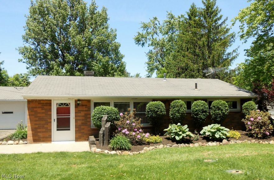 Look no further!!! This immaculate brick ranch has everything you need!  New kitchen with ceramic tile flooring and all appliances included.  Large family room with wood burning fireplace that leads out to patio, which overlooks yard.  Bathrooms are updated, new carpet in living room and bedrooms, hot water tank is new, newer windows, septic and electric boxes.  There is nothing to do but move in!