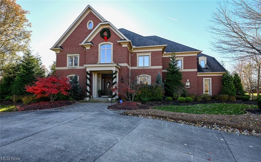 This Custom Built Brick Colonial by Valore offers Elegance! A luxurious grand estate on breathtaking grounds spared NO expense w/the highest level of finishes+detail! Interior designed, the impressive floor plan features high ceilings/crown moldings/wainscoting+dramatic arches! Enjoy/Entertain in the Fabulous Gourmet Kitchen-This chef’s dream offers professional appliances:Viking range/oven/SubZero fridge+separate full-sized freezer/hood system/beverage drawers/extensive walk in pantry/large island/wrap around seating+more! Main level also offers an exquisite foyer/luxurious Great Room w/ window wall/fireplace+built in bar area/decadent formal dining room/formal sitting room/2 half baths/Custom Executive Office/2nd office/2nd dining area/lounge area/laundry+addl. living room!2nd level offers 4 BRs w/4 full baths, large gym+the Luxurious Master Suite w/extended sitting room/wet bar/fireplaces/Full bath/spa+separate his/her custom built walk-in closets! 3rd level has custom built shelving+a wrapping room/craft area PLUS an addl. large unfinished room w/vaulted ceilings for room of choice! Lower level w/ large rec room/billiard room/arcade/2nd gym area/bonus room/In law suite/Full kitchen/Full bathroom/Custom home movie theater+more! The manicured outdoor oasis on 2+acres has Inground pool/party pavilion w/ granite kitchen+brick fireplace/Exquisite masonry/hot tub/sprinkler system+access to fully stocked fish pond behind property!4 car garage/wrap around drive! Prime Location!