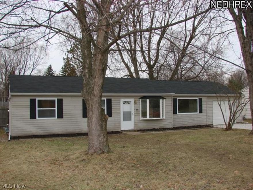 Don't miss the amazing remodeled home in Mentor. This 3 bedroom home is like new. A great open floor plan greets you as you walk in the front door. The living room is open to the vaulted family room that is perfect for entertaining and has patio doors leading you to the back patio. The new kitchen has tons of oak cabinets and plenty of counter space.  Ceramic tile is throughout the living space, kitchen and new bath. The 3 bedrooms all have new carpet. Upgrades also include a new furnace, roof, paint, trim, and windows. All this sits on a double lot with a 1 car attached garage. This is a must see and you will not be disappointed.