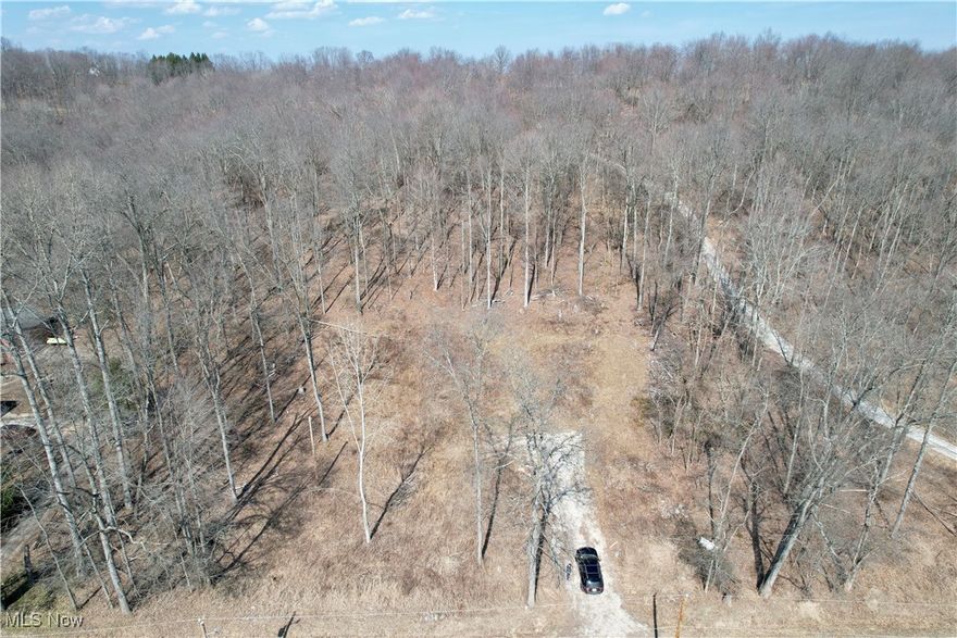 Secluded 5.3-Acre Country Property – Your Dream Lot Awaits! Escape to your own private retreat with this stunning 5.3-acre property, perfectly nestled in a peaceful, wooded setting. Whether you're looking to build your dream home or invest in land, this lot offers incredible potential. Property Highlights: 5.3 Acres of wooded, sloping land full of unique boulders and rocks, Cleared Building Site ready for your future home, Approved Septic site review valid until January 2028, Abundant Wildlife – Deer, turkeys, and more! Quiet, Private Location just minutes from town, offering both seclusion and convenience. Whether you envision a private sanctuary or a smart investment, this land offers it all. Contact us today to schedule a tour and walk the property with an agent!