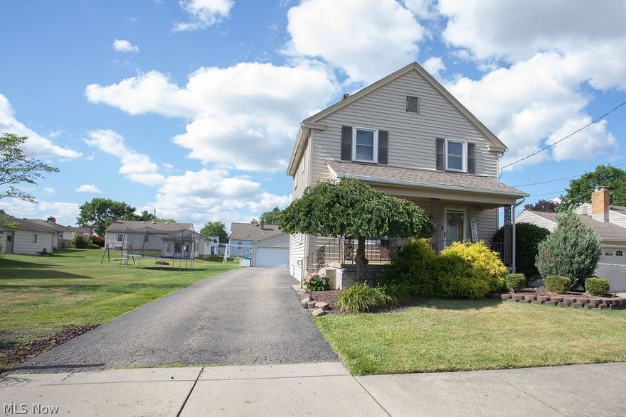 YOU SHOULD LOOK NO FURTHER!!! All you need is to see this 3 bedroom vinyl sided 2 story and your dreams will come true. An additional lot is included which is so hard to find. Enjoy the front porch and spacious rear deck in those hot summer months.  The interior is AMAZING! Beautiful updated bathroom with ceramic tile. OUTSTANDING kitchen with open concept to addition that offers plenty of room for that extra space needed for table space when quest arrive. Formal dining room and 2 full bathrooms.  Oversized double heated garage. Sidewalks are a real nice feature found in the neighborhood.  Vinyl double pane windows, laminate and wood floors are beautiful along with the updated wood package found within the home...and where do I stop?  Catch it today before it's gone tomorrow!!!
