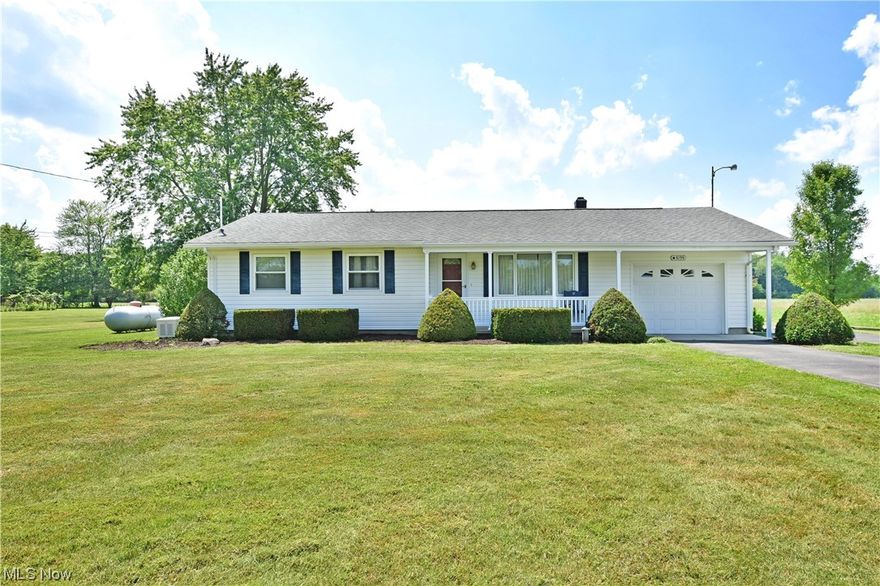 Immerse yourself in the beautiful countryside surroundings of this fantastic Bristolville ranch! Offering 
up a desirable three-bedroom layout and well-kept, move-in-ready living space; you’ll want to act 
quickly before this one slips away. Welcoming you home with its sculpted landscaping and covered front 
patio, the blacktop drive branches away to find an oversized, 26x30 detached two car garage out back. A 
second, impressively sized rear patio lets you take it all in, glancing past the flowerbeds and gardens 
alike. Make your way through the decorative front door to find a welcoming, carpeted living room as 
sunshine pours in from the large picture window. Steps away, casual dining graces the illustrious kitchen 
as the attractive wood cabinets wrap the far walls, accenting the dark stainless appliances. Down the 
main hall, a brightly lit full bath delights with its lavish tile work and frosted window adorned shower. 
Each of the three bedrooms showcase glistening hardwo