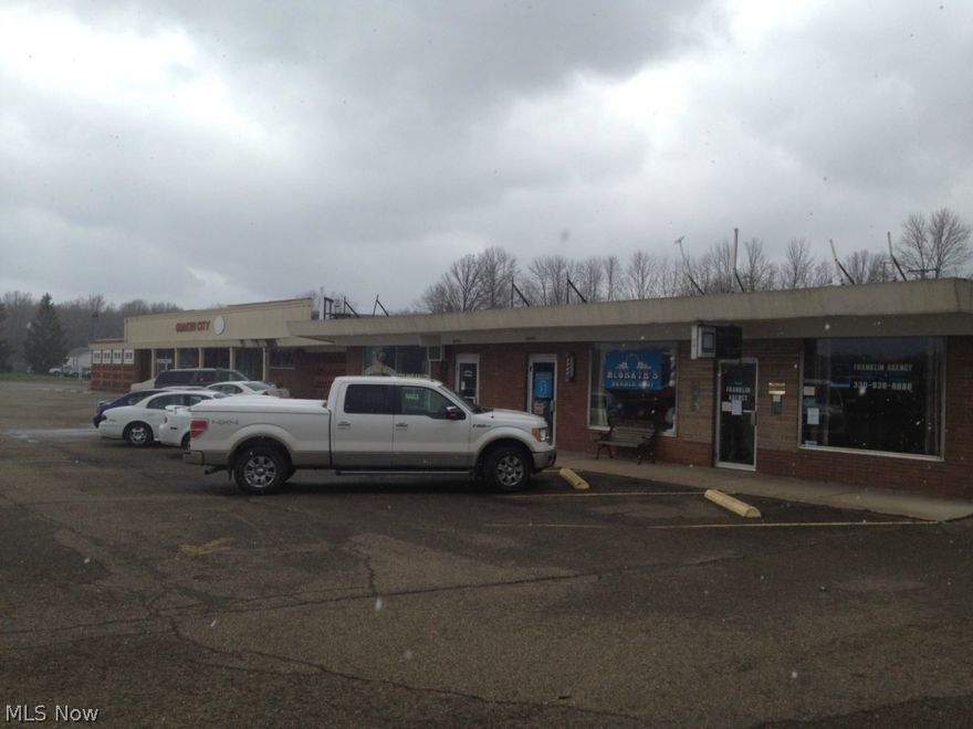 Quaker City Plaza. 33,514' strip plaza with 4 current tenants, large parking lot. Old IGA store consisting of 28,560' is currently
vacant. 2.7 acre parcel situated on busy road between Alliance and Salem. Property is now under auction terms.