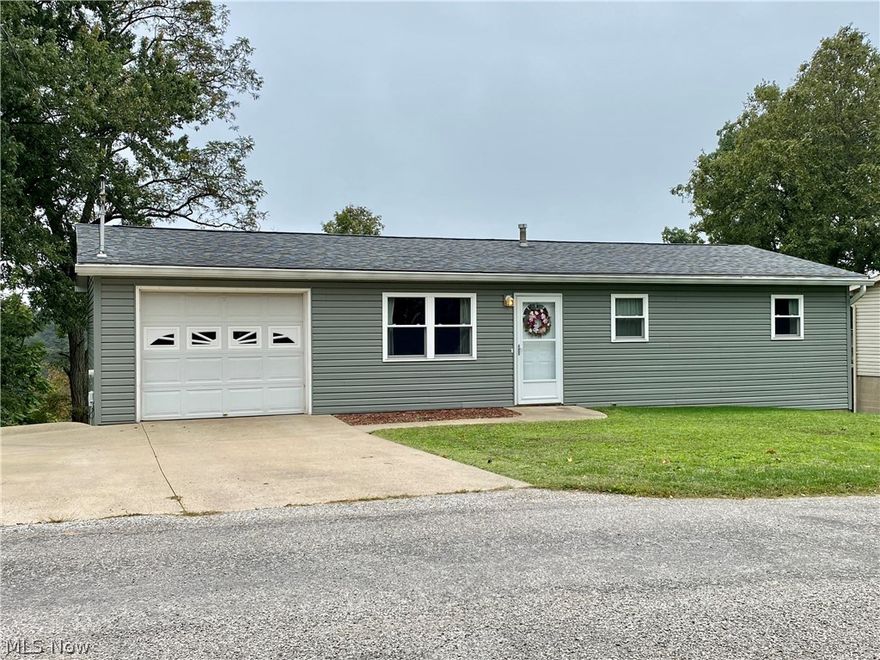 OMGosh! This is such an adorable home! Located in the Warren School district and at the end of a cul-de-sac, this home has many updates including new vinyl siding, roof, kitchen oak cabinets, recently painted deck, windows and so much more! You could even move the washer and dryer upstairs into a bedroom and you'd have all one floor living! The wooded view from the back deck is amazing! Don't let this cutie pass you by!