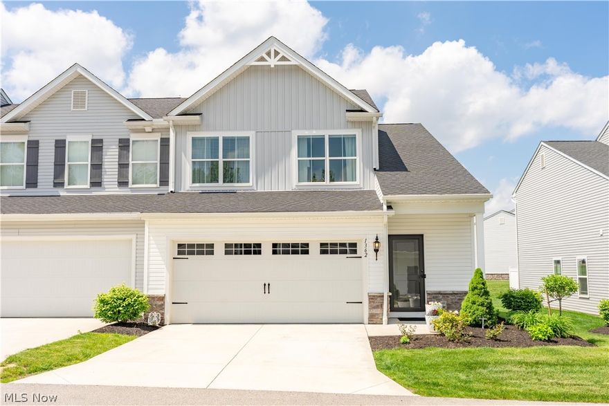 Welcome to this stunning 4-bedroom, 2.5-bath end-unit townhome, perfectly positioned on an oversized premium lot in the highly desirable Forest Lakes community of Uniontown. From the moment you step inside, you’ll appreciate the bright, open-concept design featuring 9-foot ceilings and a seamless flow between living spaces. The main level impresses with new porcelain tile flooring, custom recessed lighting, and a spacious living and dining area ideal for gatherings. The chef-inspired kitchen offers a gas range, Bosch dishwasher, and stylish modern finishes—perfect for cooking and entertaining. Upstairs, you’ll find gleaming hardwood floors in the loft and hallway, plush luxury carpeting in the bedrooms, and porcelain tile in the bathrooms. Seller made Additional upgrades after purchase that includes fresh paint throughout, upgraded doors, granite counters in kitchen and baths, Hard wood floors and Porcelain Tile on main floor adding a refined touch to every room. Seller also extended the patio, offering plenty of space for relaxing, grilling, or hosting friends. Garage has been finished. Residents of Forest Lakes enjoy access to a community park, playground, pavilion, and walking trail, creating the perfect balance of nature and neighborhood living. Located in the award-winning Green Local School District and just minutes from shopping, dining, and major highways, this home delivers the ideal mix of comfort, quality, and convenience. Don’t miss your opportunity to call this move-in-ready townhome your own in one of Uniontown’s most desirable neighborhoods! Why buy a base model when you can move in to a completely upgraded townhome ?