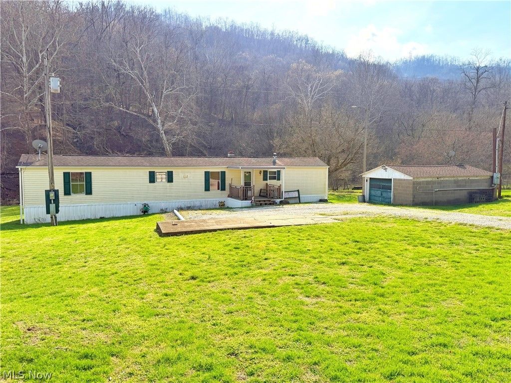 Photo of 54290 Pipe Creek Road, Jacobsburg, OH 43933 (MLS # 5196570)