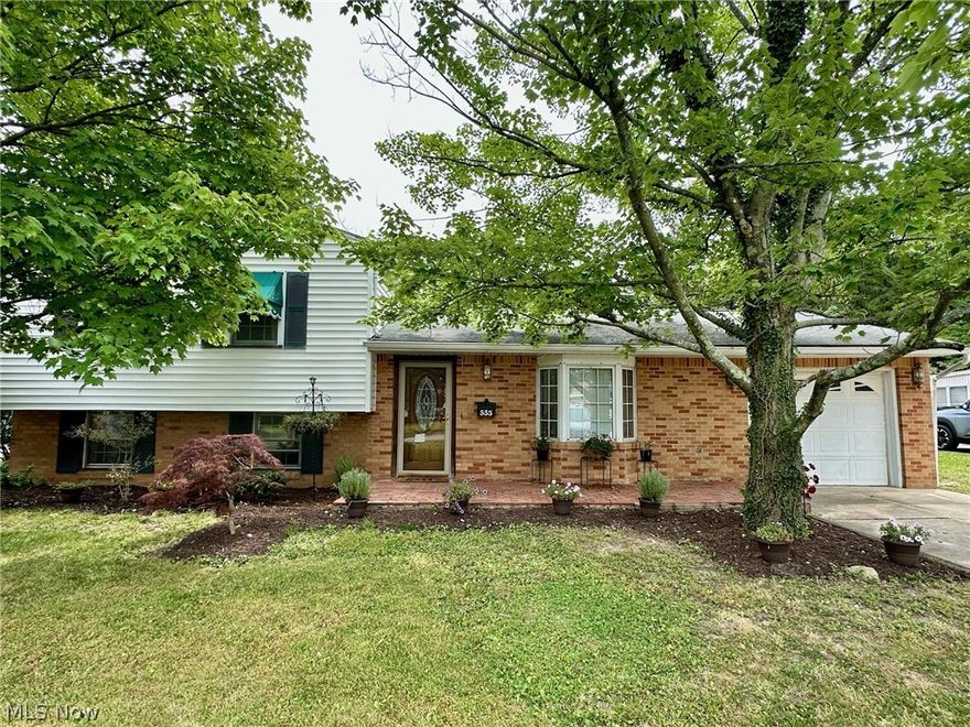 This large 3-4 bedroom split level home is move in ready! New paint and flooring throughout the first floor. The living room and kitchen are an open floor plan. An updated full bathroom and a large family room with fireplace overlooks the in ground pool - perfect space inside and out for entertaining. The lower level has a large bedroom that could be used as a 4th bedroom and the utility/storage space with exterior access. The upper level features 3 bedrooms with hardwood floors and a full bathroom. Outside, a large concrete patio and fenced in yard surround the pool. 1 car attached garage and a front patio complete the outside space. Call today! Home warranty provided.