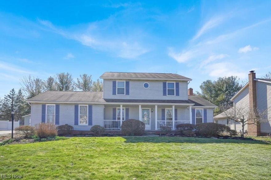 Step into the welcoming foyer with gleaming wood flooring, a coat closet and an updated half bath with a beautiful vanity. The kitchen opens to the dinette and great room - perfect for entertaining or family space. It comes fully applianced and offers Corian counters, a large pantry and a broom closet. The dinette features built-ins and a sliding door to the sun room. The family room will be a  favorite! It features beamed ceilings, an alcove with built-ins and a gorgeous stone fireplace with gas starter. There's a formal dining room and a formal living room/office. The first floor laundry room has a built-in ironing board, cabinets, a sink and outdoor access, the laundry room entry door was recently replaced, this year. Upstairs, the master suite has 2 closets, a window seat and a private full bath. The lower level has great storage,  and high ceilings for finishing potential. There's a 2-car attached garage with extra storage space. Relax in the private backyard complete with a shed