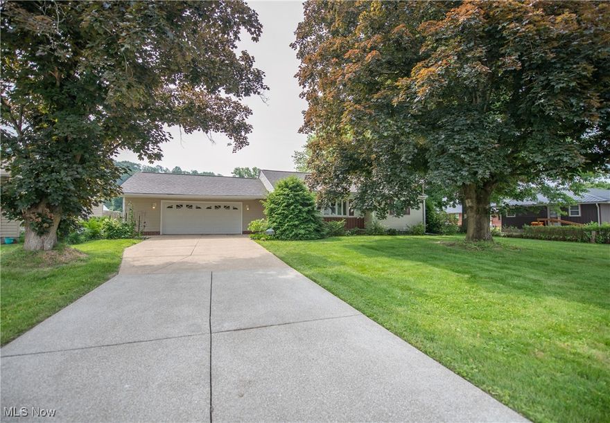 Get ready to fall in love—this stunning 3-bedroom, 2-bath home in Minerva Schools has been completely transformed from top to bottom and is bursting with high-end upgrades. Forget the projects and punch lists—everything has been done for you. Starting with serious curb appeal, this home boasts a brand-new 40-year architectural shingle roof, freshly pressure-washed exterior and concrete, leveled walkways, and sharp landscaping with mulched beds. Step inside and you’re greeted with fresh, modern finishes including all-new carpet, new vinyl flooring in all the right places, and professional interior paint throughout—yes, even the basement!

The heart of the home shines with a gorgeous solid wood live edge breakfast bar, porcelain tile backsplash, LED under-cabinet lighting, and stainless steel appliances, including a brand-new Maytag dishwasher and microwave. Even the fridge and range are newer! The hall bath has been fully remodeled with a new vanity, mirror, and fixtures, and both bathrooms, kitchen, and laundry have updated plumbing fixtures that bring function and flair. You’ll love the new LED lighting package that adds style and energy efficiency in every room.

Mechanically, this home is rock solid: enjoy a new 50-gallon gas water heater, a new water softener (owned, not leased), an updated HVAC heat pump with central A/C, and updated plumbing and electrical—including a 200 AMP main panel and new 100 AMP subpanel in the basement bonus space. The attic and basement have a fresh full insulation package to keep things cozy and efficient year-round. Public water and sewer, a fully fenced backyard, new micro-mesh leaf guards, and a new first-floor laundry room round out this total package.

It’s clean, crisp, stylish, and 100% move-in ready. This isn’t just a home—it’s a whole new lifestyle. Welcome to your next chapter in Minerva! Call today to schedule your own private showing!