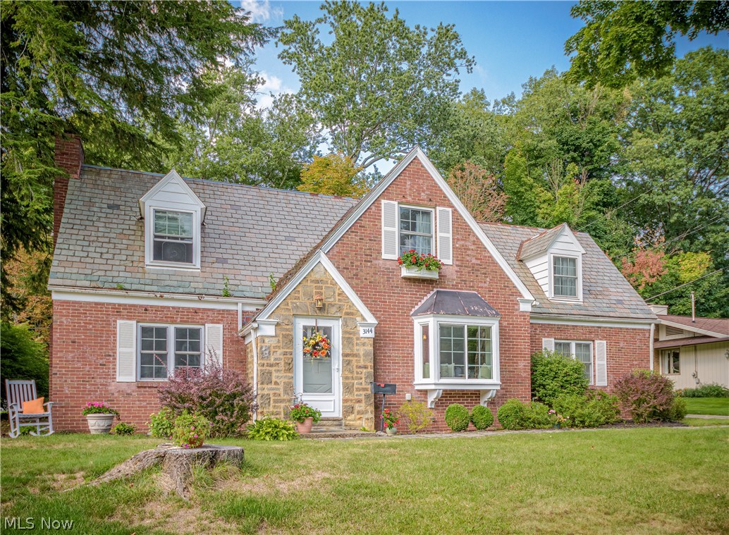 Charming Cape with beautiful curb appeal situated in Silver Lake Estates on a nice sized semi private lot with Silver Lake privileges included! Swimming, fishing, boating, picnic areas, hiking trails and more. Stepping into the foyer entry leads into the formal living room and formal dining room with crown molding and beautiful hardwood floors. Nice sunroom across the back of the house surrounded by windows offering views of the park like backyard and patio. The kitchen and 1/2 bath complete the first floor. Upstairs you'll find three nice sized bedroom with hardwood floors and a full bath with a tub and separate shower. The lower level has a finished rec room and an extra storage room. Windows replaced in '04. Home warratny included.