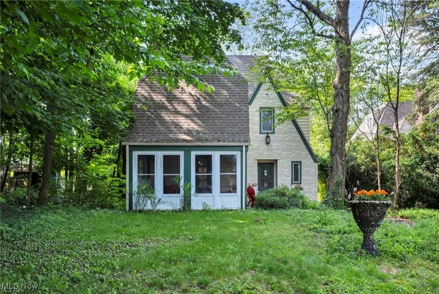 Welcome to this fully renovated and beautifully restored Colonial, offering four spacious bedrooms, two full bathrooms, and two half baths. Blending timeless charm with thoughtful modern upgrades, this home is an exceptional choice for both a primary residence or a high-performing income property. Between 2022 and 2024, the home underwent an extensive transformation. Major updates include new HVAC systems-including a dedicated unit for the third floor- new ductwork, updated plumbing, and a fully upgraded electrical system with a new panel, outlets, and fixtures. The majority of the home features new drywall and insulation, enhancing energy efficiency and comfort throughout. The main level boasts solid oak flooring, while original oak floors have been refinished throughout the rest of the home. Bathrooms are updated with stylish and durable vinyl flooring. The reimagined kitchen offers custom cabinetry, granite countertops, and a functional open layout perfect for entertaining and everyday living. Original doors and windows have been carefully restored and paired with storm inserts, while brand-new vinyl windows have been added to the third floor and main-level laundry/mudroom. Additional highlights include a charming enclosed- sunroom, a second-floor balcony that overlooks the beautifully landscaped yard and an attached two-car garage. The home sits on a large lot, offering plenty of outdoor space for relaxation, entertaining, or future expansion. Ideally located just minutes from Cleveland Clinic, University Hospitals, Case Western Reserve University, Severance Town Center, and Cleveland's world-renowned museums and cultural institutions, this home offers the perfect blend of convenience, lifestyle, and long-term value. Whether you're seeking a move-in ready residence or a strong investment with income potential, this property delivers on all fronts.