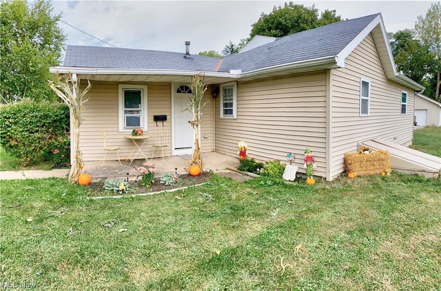 New listing alert! This cozy 2 bedroom ranch is ready for a new family and has updates throughout. Bamboo flooring through the living room and dinette. Tile floors in the kitchen and bathroom. Newer carpet in both bedrooms. Kitchen appliances and washer/dryer stay. Replacement windows. Composite deck (2 years old). Oversized 2+ car garage with variable 50k-100k btu gas heater (2 years old) and newer garage floor (4 years old). Total of three lots for a spacious yard. Low traffic street just off of Main in a convenient East side of Bellevue location walking distance to Miller's, Family Dollar and Casa Mexicana.

Act on this cute home and make it your own!