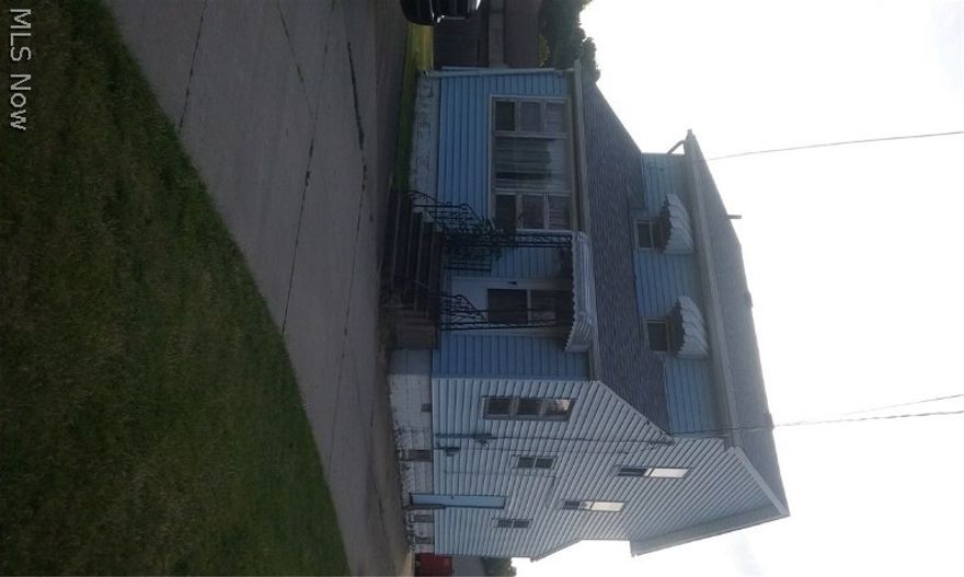 Handyman special! Zoned residential or C2 commercial. 3 bedroom 1.5 bath with hailstorm roof '05, blown-in insulation, hardwood floors, copper, 100 amp & updated siding on large lot! Just needs your attention to be your home, rental, or business!