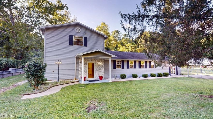 Beautiful and versatile, 8908 Southern Highway in Rockport, WV is waiting to welcome you home! This well cared for home offers spacious living with thoughtful and gorgeous details throughout.-complete with a private apartment or in-law suite! The main home features a large, but cozy felling living room with a gas fireplace and a large dining area, both perfect for entertaining. Granite countertops, new appliances and hand-crafted custom cabinets make the kitchen a must see! A couple of bonus rooms offers the flexibility of being used as additional bedrooms or living spaces, storage, office, etc. Out back the separate mother-in-law suite has its own entrance and is equipped with a full kitchen with custom cabinetry and a band new stove. It's the perfect set up for guests, rental income, or extended family. Additional highlights include a detached one stall garage, a large carport, a new hot water tank and access to high speed internet-ideal for those who work or study from home. Located just outside of Parkersburg, this gem offers space, flexibility and room to grow!